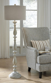 Ashley Furniture Bernadate lamp set featuring two elegant floor lamps with fabric shades and a modern design.