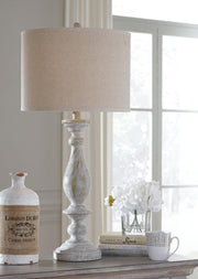 Ashley Furniture Bernadate floor lamp set with two elegant, modern lamps featuring sleek bases and fabric shades.