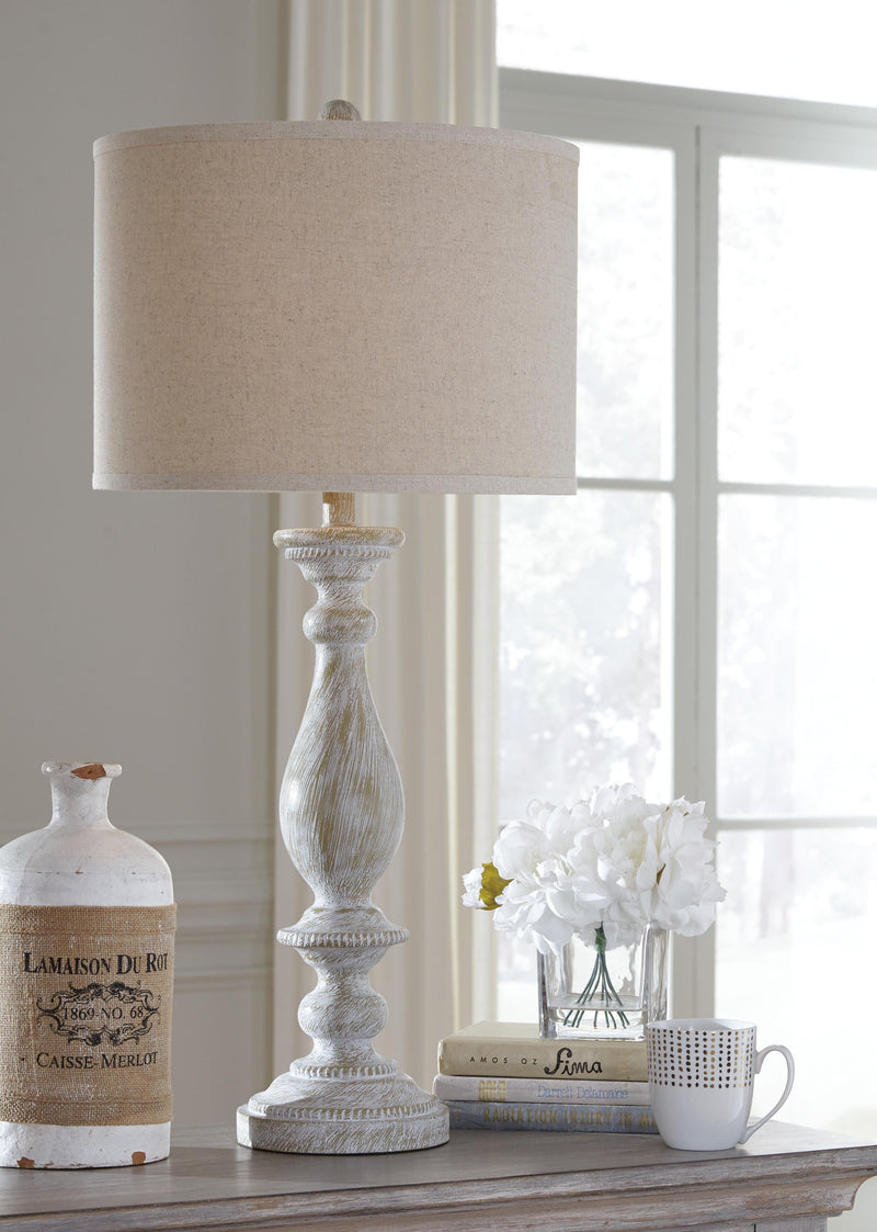 Ashley Furniture Bernadate floor lamp set with two elegant, modern lamps featuring sleek bases and fabric shades.