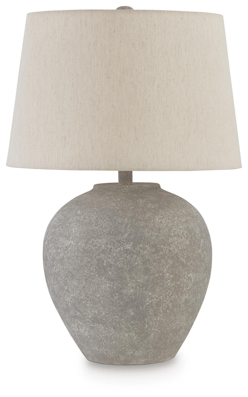 Ashley Furniture Dreward table lamp with a sleek base and fabric shade, ideal for accent lighting in living spaces.