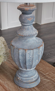 Ashley Furniture Cylerick table lamp set featuring two stylish lamps with fabric shades and decorative bases.