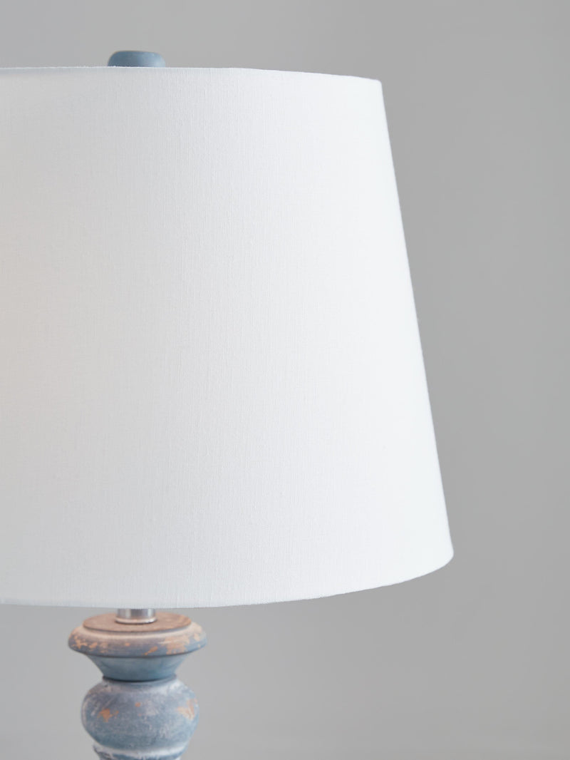 Ashley Furniture Cylerick table lamp set with detailed fabric shades and sleek bases, ideal for modern home decor.