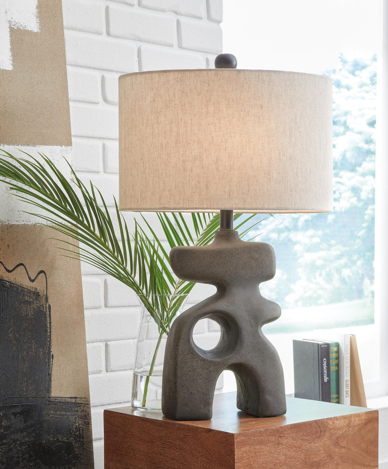 Ashley Furniture Danacy table lamp set featuring two elegant lamps with fabric shades and a modern design.