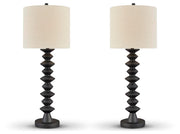 Ashley Furniture Luanndon table lamp set with two elegant lamps featuring neutral shades and wooden bases.