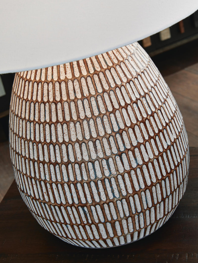 Ashley Furniture Darrich table lamp set featuring stylish lamps with neutral shades and modern bases.