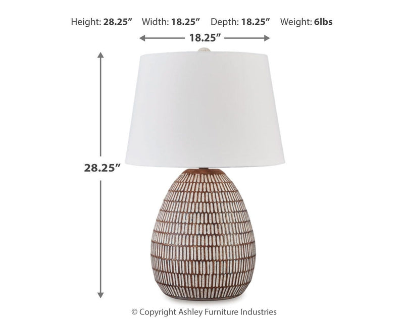 Ashley Furniture Darrich table lamp set with two elegant lamps featuring neutral fabric shades and decorative bases.