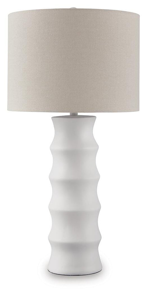 Ashley Furniture Veraleigh table lamp with a sleek base and fabric shade, perfect for enhancing living room or bedside decor.