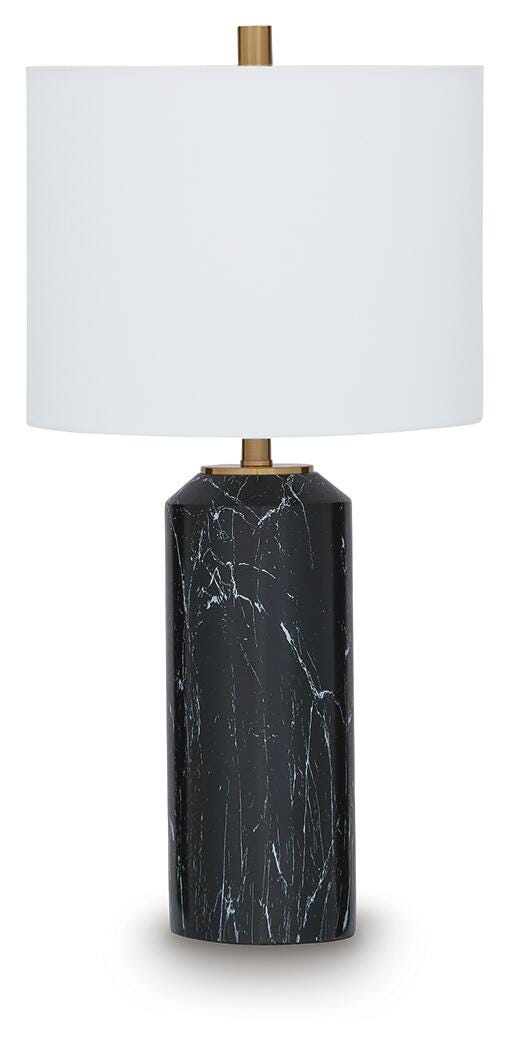 Hanzila table lamp by Ashley Furniture featuring a sleek base and fabric lampshade on a wooden side table.