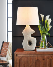 Pair of Ashley Furniture Chadrich table lamps with beige drum shades and dark wood bases, ideal for bedside or living room decor.