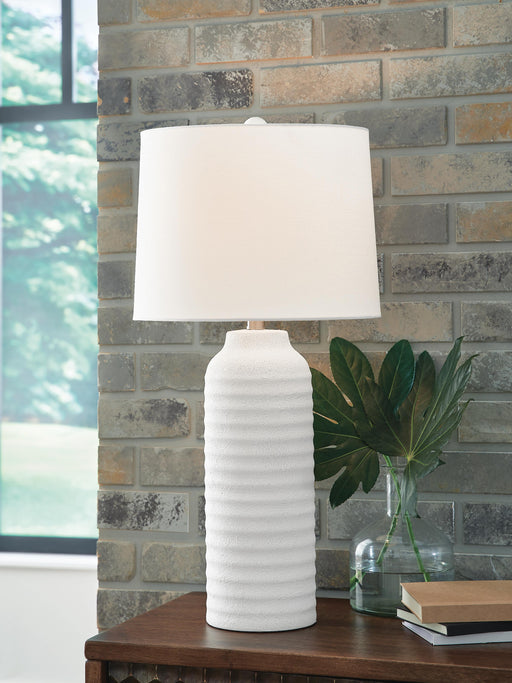 Pair of Ashley Furniture Vauville table lamps with fabric shades and wooden bases, ideal for bedside or living room decor.