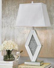 Ashley Furniture Prunella Lamp Set with two modern table lamps featuring neutral fabric shades and sleek bases.