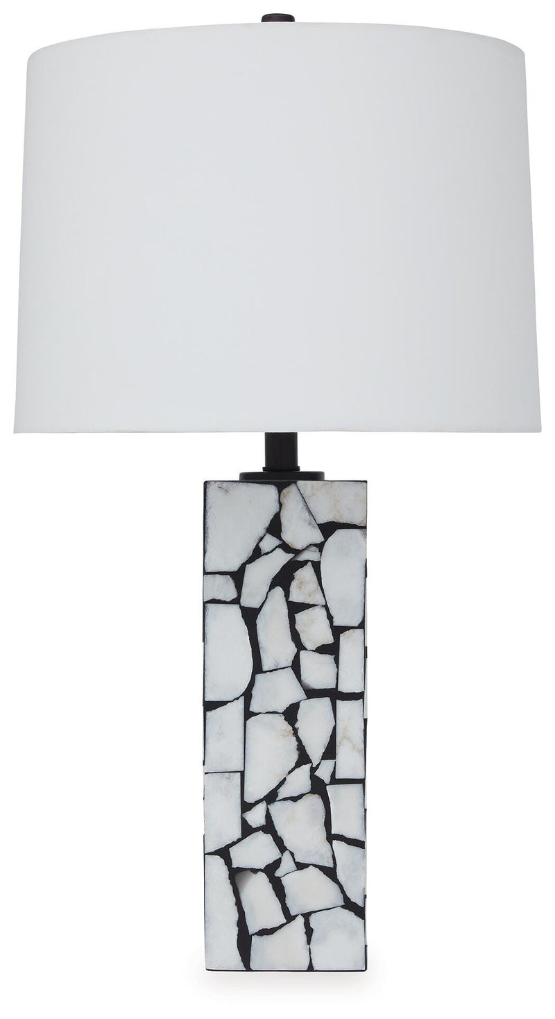 Ashley Furniture Macaria table lamp with a sleek design and fabric shade, perfect for enhancing home decor.