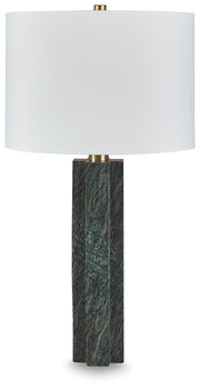 Ashley Furniture Keegan table lamp with a sleek base and fabric lampshade, perfect for modern living room or bedside decor.