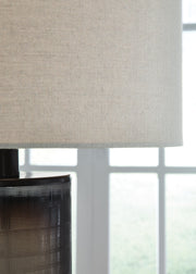 Ashley Furniture Dingerly Table Lamp Set with textured shade, featuring modern design and warm lighting details.