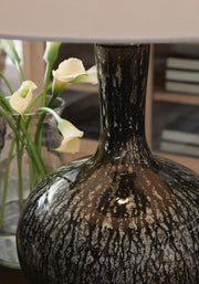 Ashley Furniture Tenslow Lamp Set featuring two modern table lamps with textured beige shades and sleek base designs.