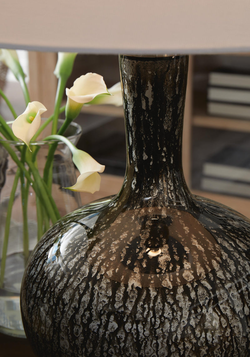 Ashley Furniture Tenslow Lamp Set featuring two modern table lamps with textured beige shades and sleek base designs.
