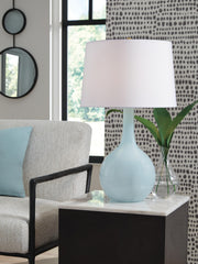 Rylanton table lamp by Ashley Furniture featuring a sleek base and fabric shade, ideal for modern living room or bedside decor.