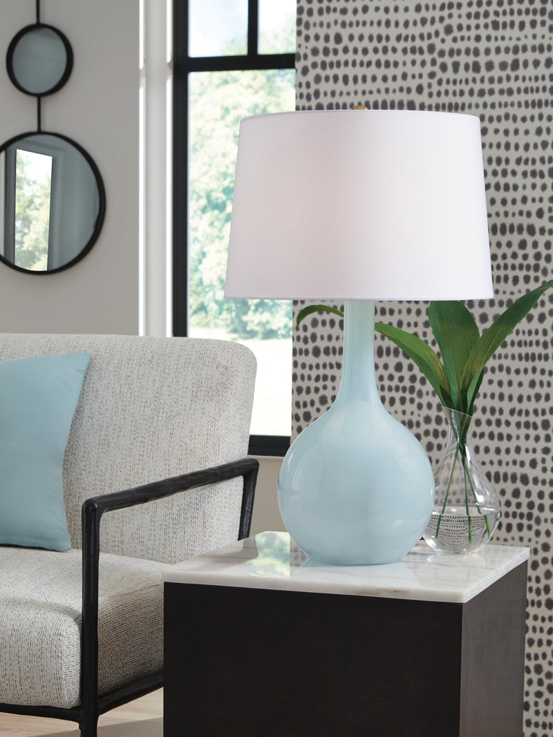 Rylanton table lamp by Ashley Furniture featuring a sleek base and fabric shade, ideal for modern living room or bedside decor.