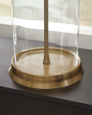 Close-up of the base of a Gizeh Table Lamp by Ashley Furniture, showcasing its modern design and textured surface.