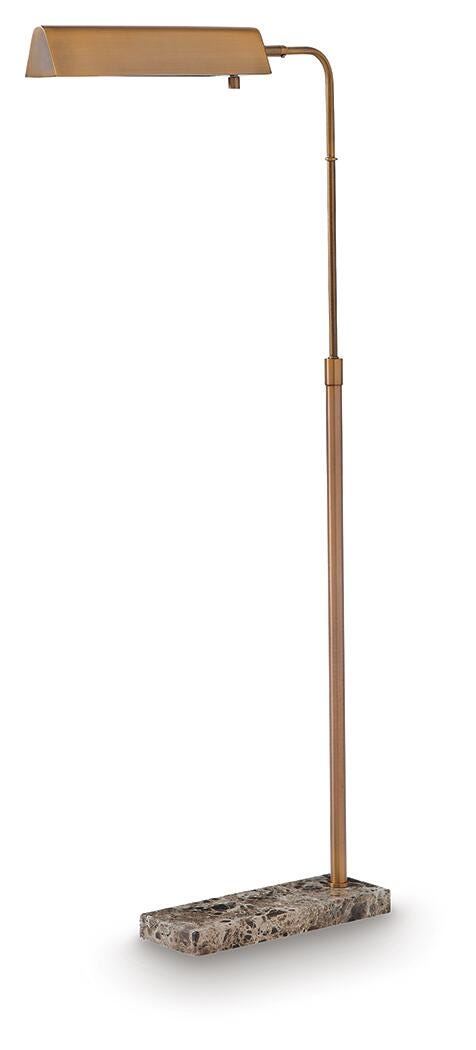 Ashley Furniture Yafe floor lamp with a sleek, modern design and a warm fabric shade standing on a wooden base.