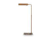 Ashley Furniture Yafe floor lamp with a sleek design, featuring a tall stand and a modern lampshade.