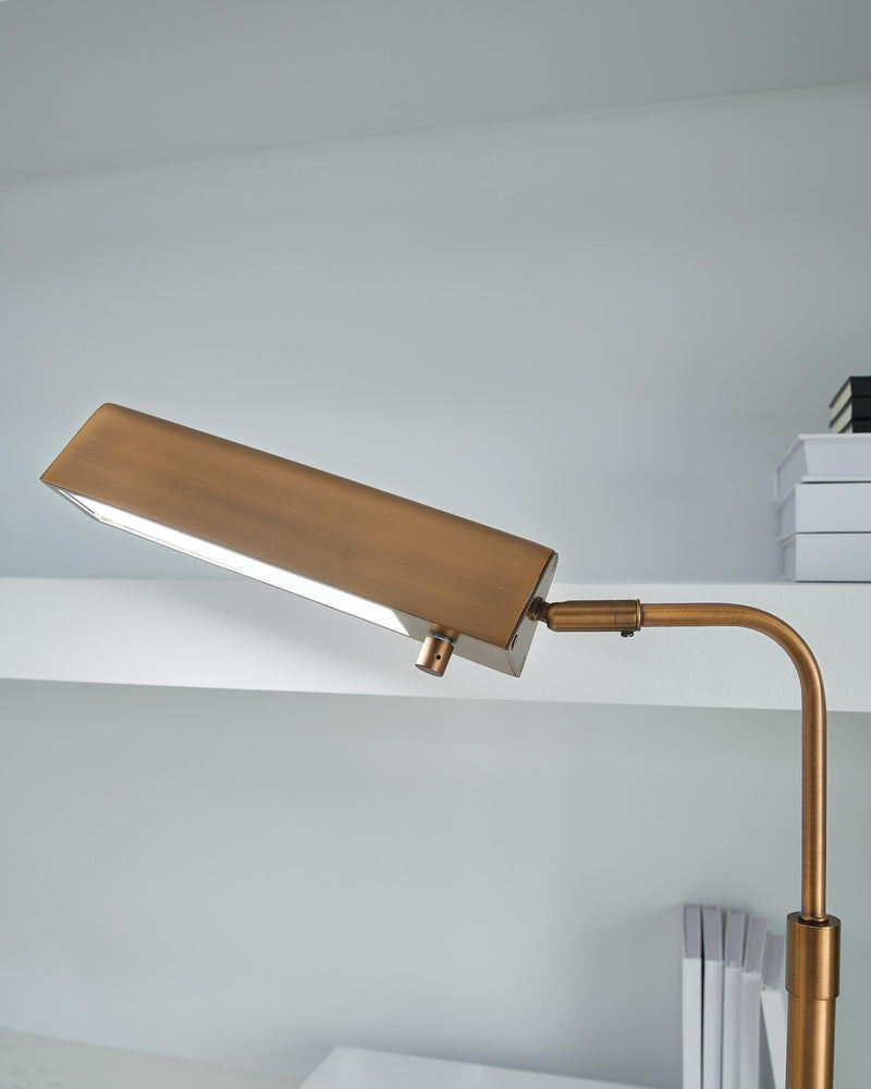 Ashley Furniture Yafe Desk Lamp, stylish table lamp with a sleek base and fabric shade, perfect for home or office lighting.