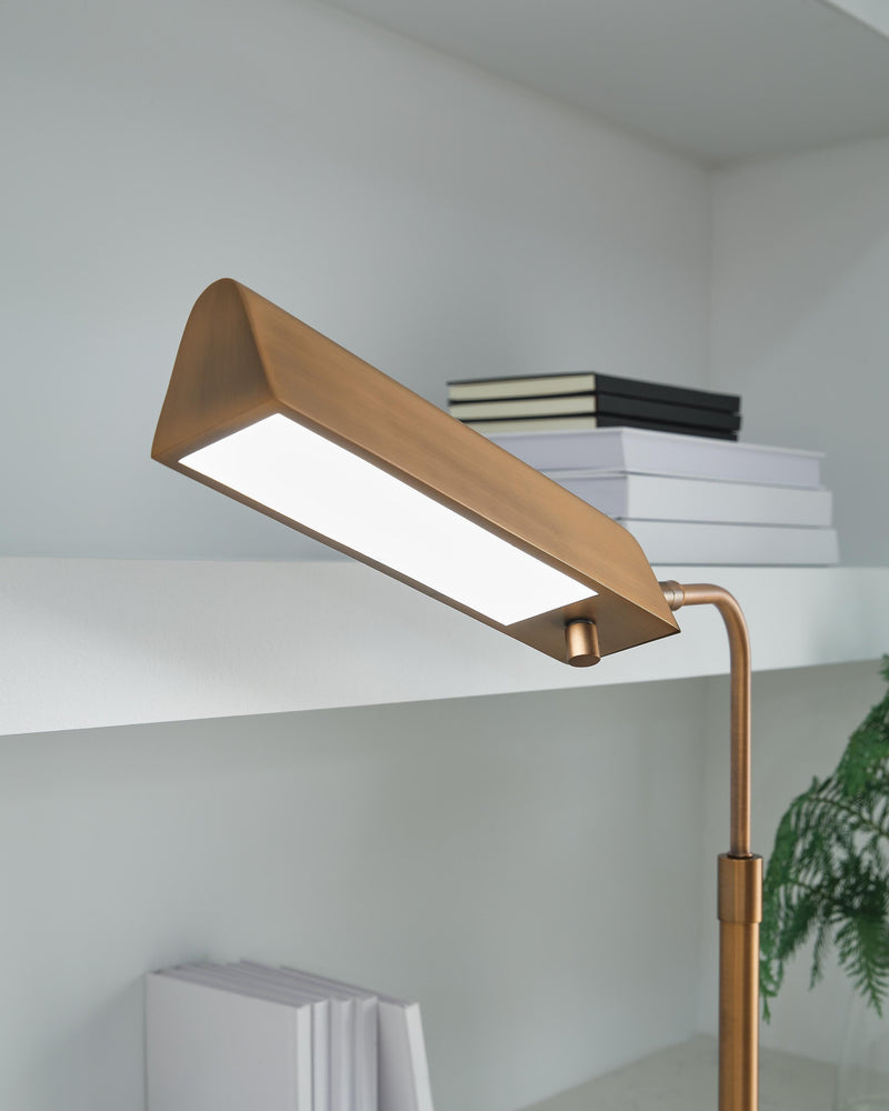 Ashley Furniture Yafe desk lamp, modern table lamp with a sleek design and neutral finish, perfect for home or office lighting.