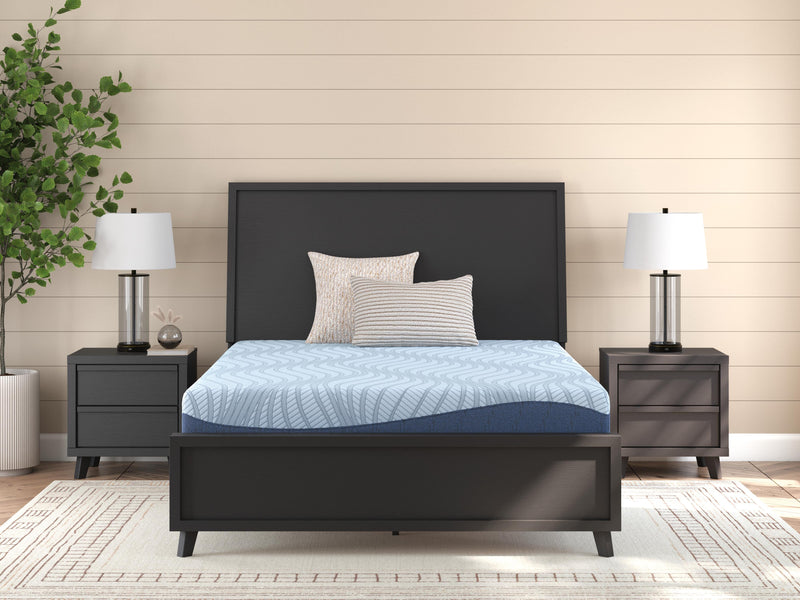 Ashley Furniture Peak 2.0 10-inch Memory Foam Mattress showing plush surface and supportive foam layers in a bedroom setting.