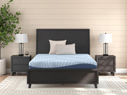 Ashley Furniture Peak 2.0 10-inch Memory Foam Mattress, showing plush surface and supportive foam layers in a bedroom setting.
