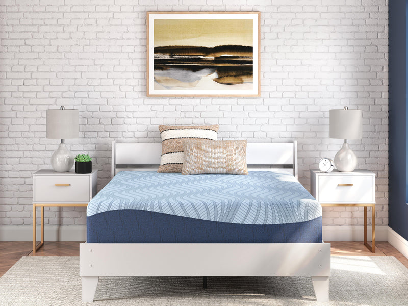 Ashley Furniture Peak 2.0 12-inch memory foam mattress with plush cover and supportive foam layers for restful sleep.