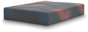 Ashley Furniture 13-inch hybrid hot buy mattress shown from an angled side view, showcasing the mattress surface and construction.