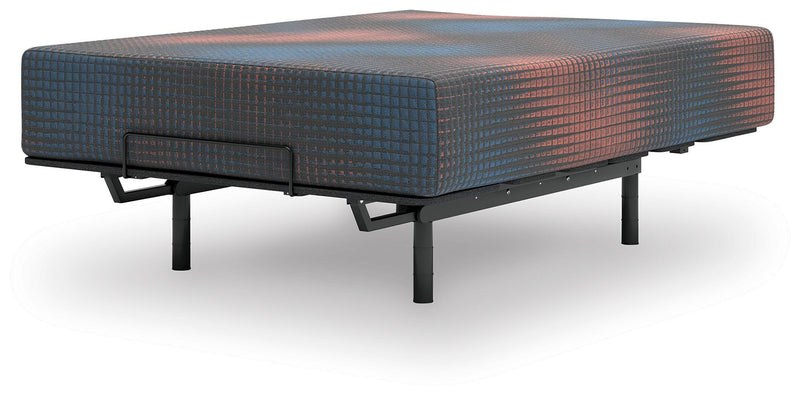13-inch hybrid mattress from Ashley Furniture, showing plush top and supportive edges in a modern bedroom setting.