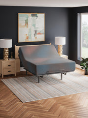 13-inch hybrid mattress by Ashley Furniture with plush fabric cover and reinforced edges, displayed vertically.