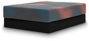 13-inch hybrid mattress from Ashley Furniture, showing plush top layer and supportive base in a side angle view.