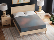 13-inch hybrid mattress by Ashley Furniture with plush top layer, showcasing the comfortable and supportive design.