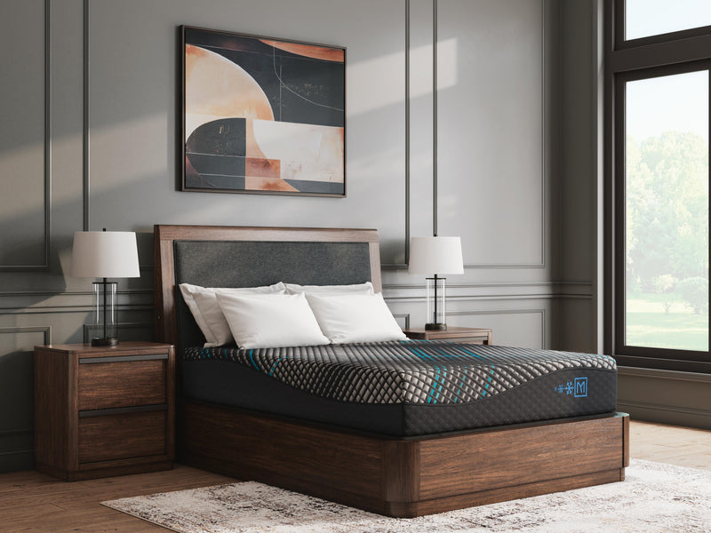 Ashley Furniture Millennium 2.0 Foam 12-Inch Memory Foam Mattress shown on a bed with a neutral bedroom background.