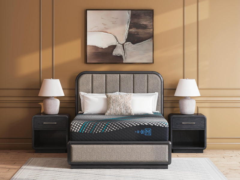 Ashley Furniture Millennium 2.0 Hybrid 14-inch innerspring mattress with plush top and supportive coils, shown in a bedroom setting.