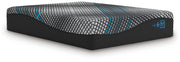 Ashley Furniture Millennium 2.0 Hybrid 16-inch mattress with a plush top and supportive base, shown from an angled side view.