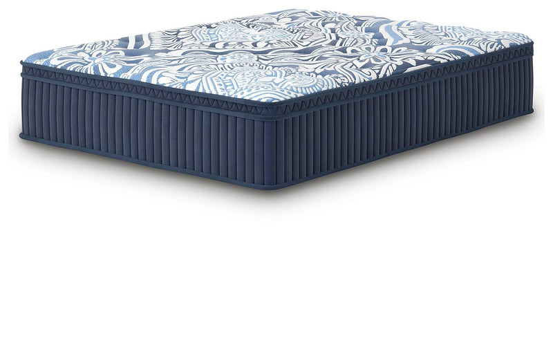 Ashley Furniture Plush Luxe 2.0 innerspring mattress shown from an angle with plush top and supportive coils.