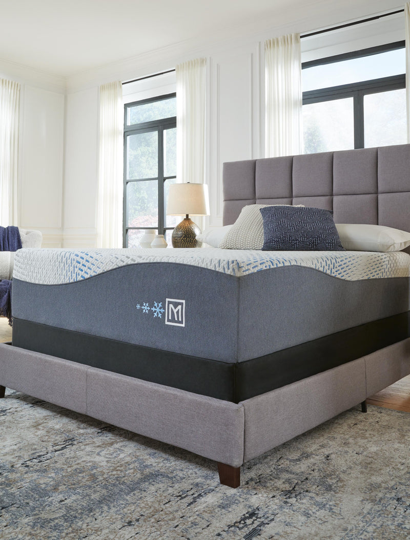 Ashley Furniture Millennium Luxury Gel Memory Foam Mattress showing plush surface and supportive memory foam layers.