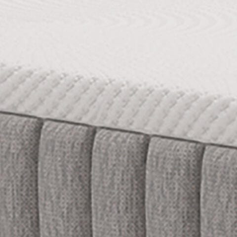 Ashley Furniture Terra Sleep medium hybrid mattress with plush top and supportive layers, shown in a close-up image.