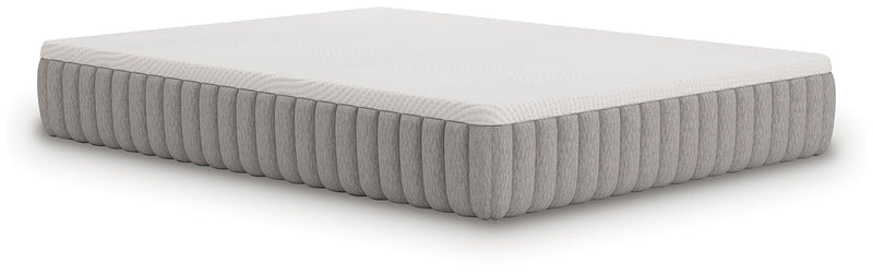 Ashley Furniture Terra Sleep Firm Hybrid Mattress shown at an angle, highlighting the mattress's firm surface and plush top layer.