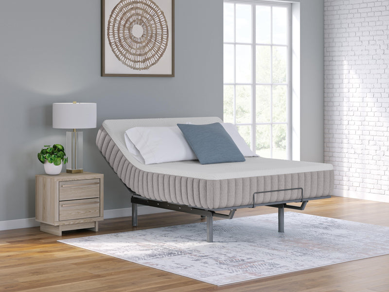 Ashley Furniture Terra Sleep Firm Hybrid Mattress with a plush top and supportive foundation, shown in a horizontal view.