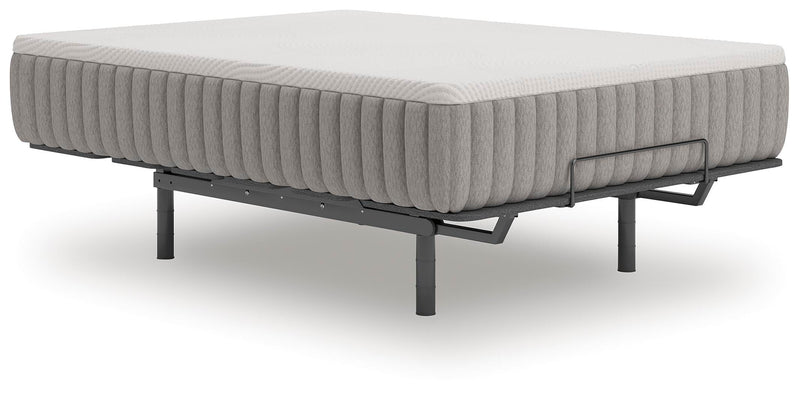 Ashley Furniture Terra Sleep Soft Hybrid Mattress shown from an angle, highlighting the plush, comfortable surface and mattress design.