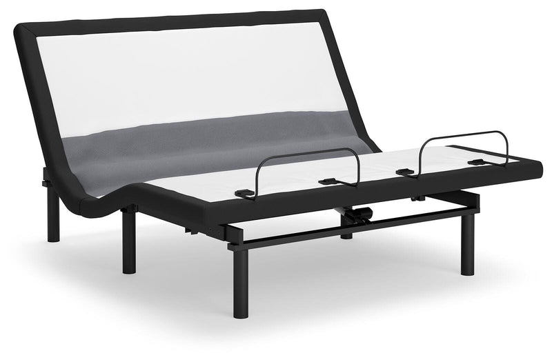 Ashley Furniture adjustable base with lumbar support and audio controls, shown in a raised position with sleek design and customizable features.