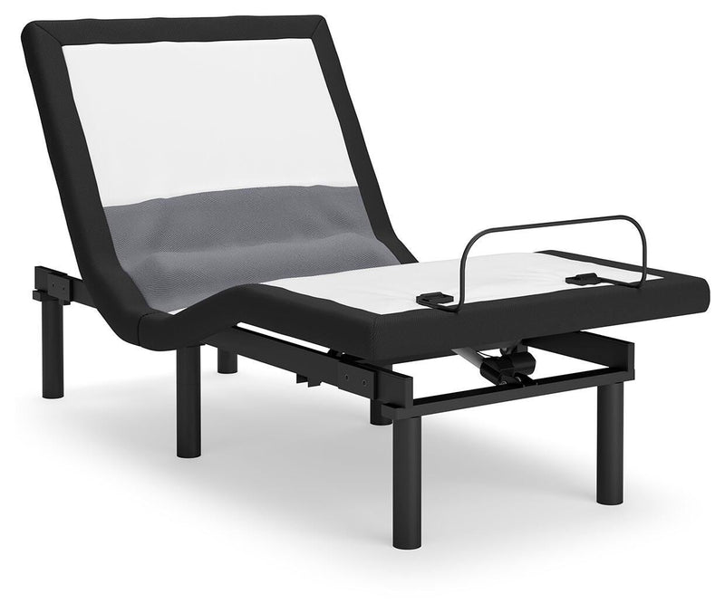 Adjustable base with lumbar support and audio controls by Ashley Furniture, shown in a raised angle with a sleek design.