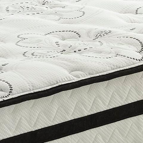 Ashley Furniture Chime 10-inch hybrid mattress in a box with plush white cover and supportive foam and coil layers.