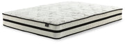 Ashley Furniture Chime 10-inch hybrid mattress in a box, showing a plush, layered design with a soft fabric cover.
