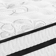 Ashley Furniture Chime 10-inch hybrid mattress in a box with soft fabric cover and supportive layers, ready for easy setup.