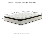 Ashley Furniture Chime 12-inch hybrid mattress in a box, showing the plush fabric cover and layered construction for support and comfort.